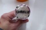 A stick of rock with the name Charlie in the middle