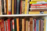 Bookshelves full of cookbooks.