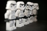 Storm Troopers standing in lie with one stick out