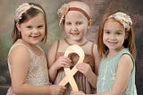 Heartwarming photo shows the incredible recovery three little girls with cancer have made