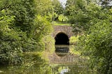 Photo by Author of a canal and a tunnel