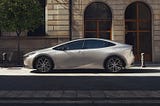 2023 Toyota Prius Limited parked on a city street.