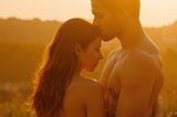A sexy couple embraces in the warm sunshine. They are both shirtless and he kisses her forehead. AI-generated.