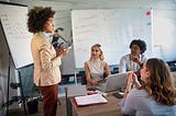 Woman leading a team briefing