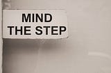 ‘Mind the step’ sign