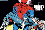 Spider-Man holds Black Cat’s unconscious, injured body