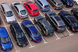 An ariel view of a local car dealership lot