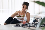 iStock image. Woman eating health meal.