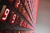 neon display of strings of numbers