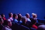 People sitting on gang chairs