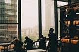 Photo by <a href=”https://unsplash.com/@jo_negatives?utm_content=creditCopyText&utm_medium=referral&utm_source=unsplash">Olegs Jonins</a> on <a href=”https://unsplash.com/photos/people-sit-and-work-by-a-large-city-window-WjZQ0ksfpXY?utm_content=creditCopyText&utm_medium=referral&utm_source=unsplash">Unsplash</a>