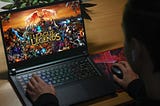 Person playing League of Legends on Laptop