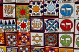 Bright magnets displaying symbols of Judaism