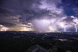 Night view of a thunderstorm from Sharp Top Mountain, Virginia, captured by Jason Rinehart, HartLight Photography