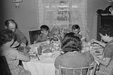 Rothstein, A., photographer. (1939) Farm family at dinner. Fairfield Bench Farms, Montana. Montana Fairfield Bench Farms United States Teton County, 1939. May. [Photograph] Retrieved from the Library of Congress, https://www.loc.gov/item/2017777606/.