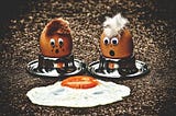 Two boiled eggs morning their sunny side up friend