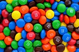 How M&M makes people keep craving for the chocolate candies?