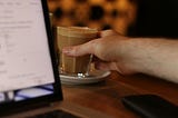 Software Developer Reaching For Coffee