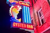 Sorry Charlie’s Oyster Bar; neon sign with a brightly colored fish