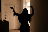 Woman dancing at home