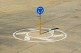 Blue and Yellow Road Sign
