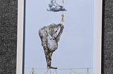 A gorilla stands still on a thin gold wire with pretty tassels. Holding a reflective balloon tied to its hand via a gold string with tassels, the gorilla puts that hand on its head looking down and contemplating. A few small clouds are above the sky.