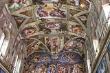 The Sistine Chapel, full of intricate frescoes.