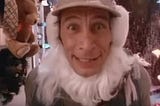 Ernest P Worrell popping in Vern’s door with a Santa beard on and a huge excited look on his face.