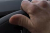 grasping the wheel