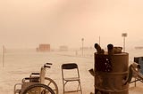 Manual Wheelchair is left in the middle of a sandstorm