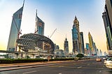 View of Sheikh Zayed Road with Emirates Towers in the background.