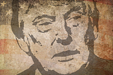 An artistic rendering of Donald Trump’s face on a background of the American Flag. Image is worn and faded.