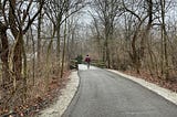 crossing a bridge on a cold hike