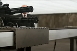 WEAPONIZING IOT: CONSTRUCTING A MINI-GUN RAIL LIKE THE ONE IN DARK KNIGHT.