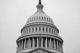 Black and white image of the dome at the capitol in Washington D.C.