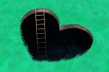 A heart shaped hole in the ground with a ladder leading down into it