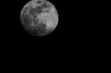 A close up of the moon in the night sky