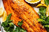 Slow roasted salmon with lemon garlic yogurt sauce