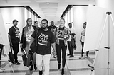 Members of the Florida Rights Restoration Coalition walk through the halls of the Florida State Capitol on their way to meet with elected officials during Advocacy Day.