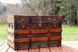 Steamer trunk for clothes storage