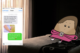 On the right: The Blob sitting on a bed in a dimly lit, dark, shadowy room, her face lighting up from the smartphone screen. On the left: A fake text message conversation with a pregnancy announcement along with a photo, and a cheerful reply with a congratulations.