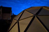 Cardboard dome with the moon and Venus visible in the sky