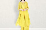 Buy latest women Indian Ethnic Yellow kurti or kurta for haldi function by Sionnah. latest kurti designs set with palazzo.