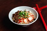 The Origins and History of Kolo Mee