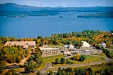 Aerial view of an old hotel overlooking a lake