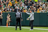 Green Bay Packers head coach Matt LaFleur argues with a referee during an NFL game at Lambeau Field in Green Bay.