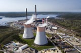 fossil fuel power plant burning coal to produce electricity and heat for local community located in Rybnik and near lake