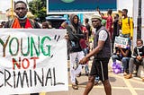 Young Nigerians protesting. I take no credit for the image. It was gotten from Teen Vogue site.