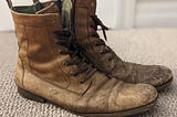 Well Worn Brown leather boots with a zipper