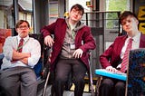 Ruben Reuter, Jack Carroll and Zak Ford-Williams in character as Dan, Mike and Sonny on the Mobility bus